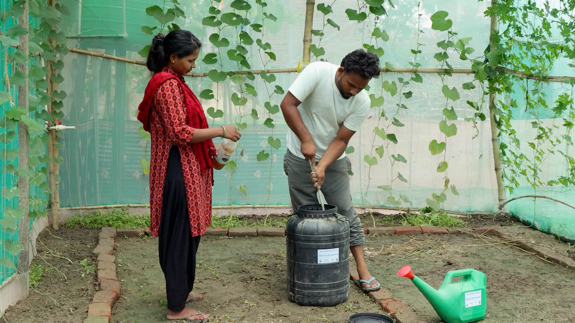 BHola and Shila Harijan preparing Jholmol in their Nursery